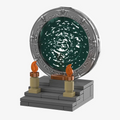 Brick-built Stargate with event horizon on a stepped platform with torches