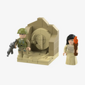 Soldier minifigure at a sandstone wall and a minifigure of a young woman from Abydos